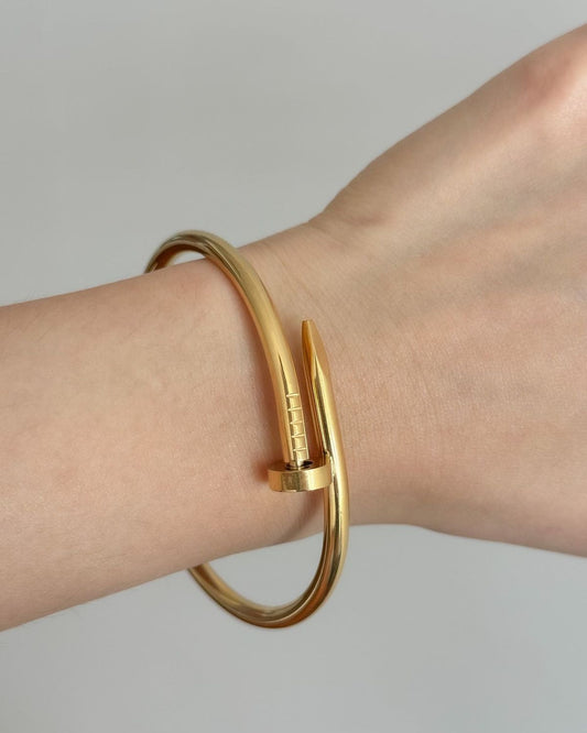 Sleek Gold Nail Cuff Bracelet