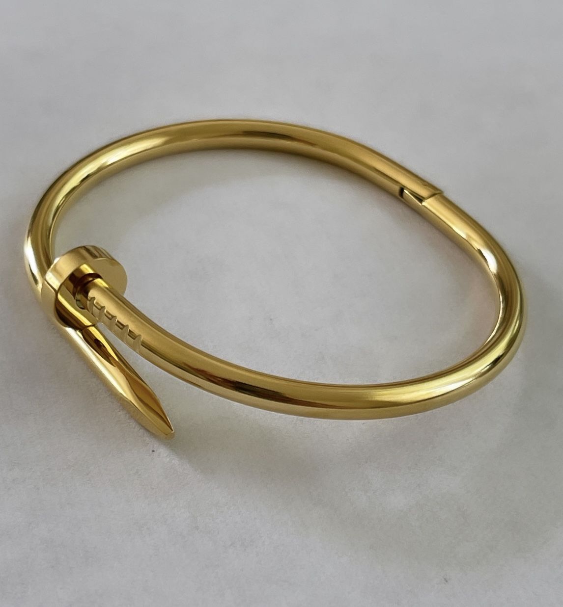Sleek Gold Nail Cuff Bracelet