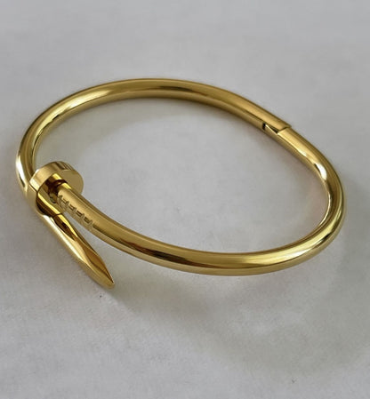 Sleek Gold Nail Cuff Bracelet